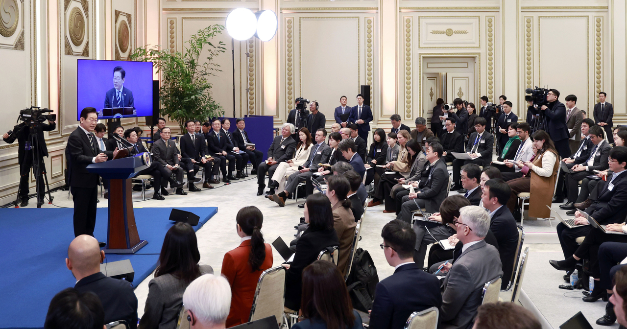 President Lee Jae Myung attends a press conference with foreign media at the former presidential office, Cheong Wa Dae, in Seoul on Wednesday, to mark the one-year anniversary of the Dec. 3 martial law crisis. (Pool photo via Yonhap)