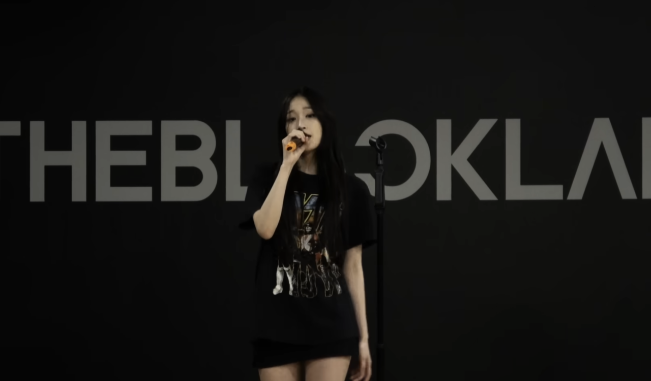 Allday Project's Annie is seen practicing rapping during her time as a trainee at The Black Label, as seen on Allday Project's short documentary "Day 1." (Allday Project/YouTube)